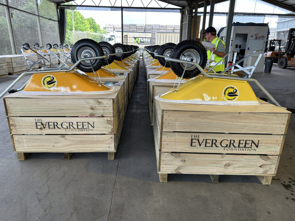 yellow wheelbarrows in bins