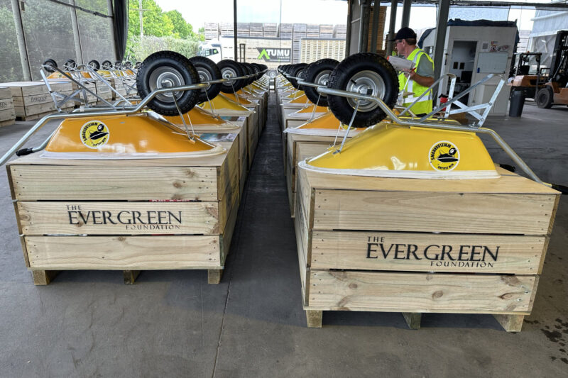 yellow wheelbarrows in bins